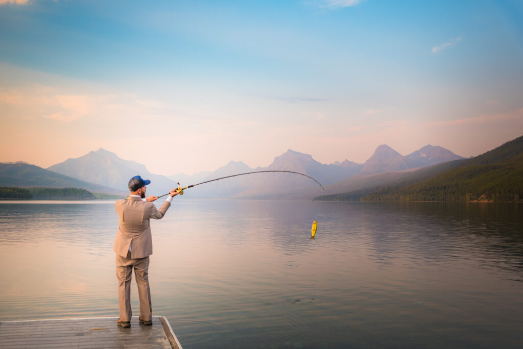 Fishing in Montana during an adventure elopement at Glacier National Park