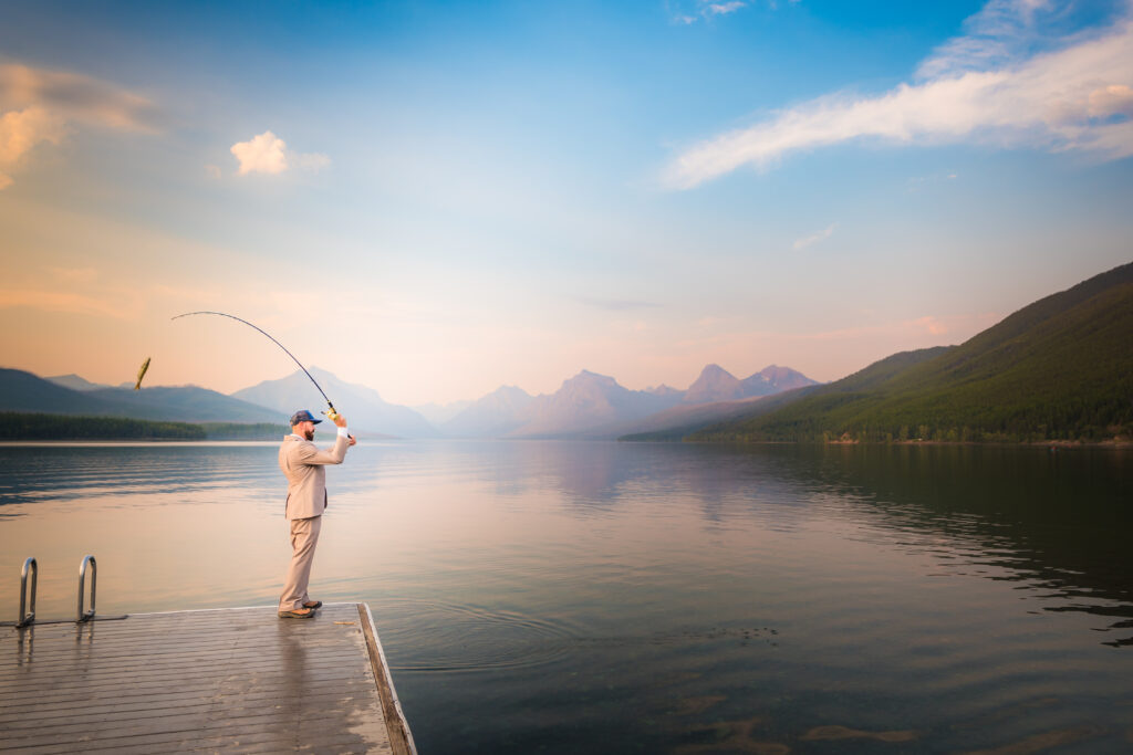 Fishing in Montana during an adventure elopement at Glacier National Park