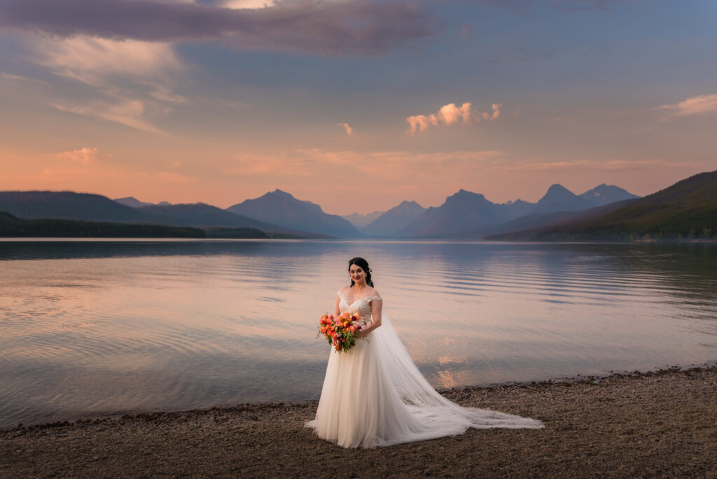 Bridal Portraits by the lake at Glacier National Park during a Montana Elopement