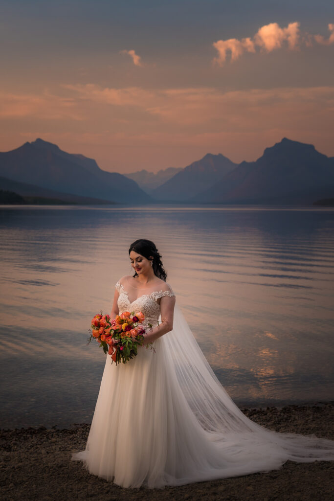 Bridal Portraits by the lake at Glacier National Park during a Montana Elopement