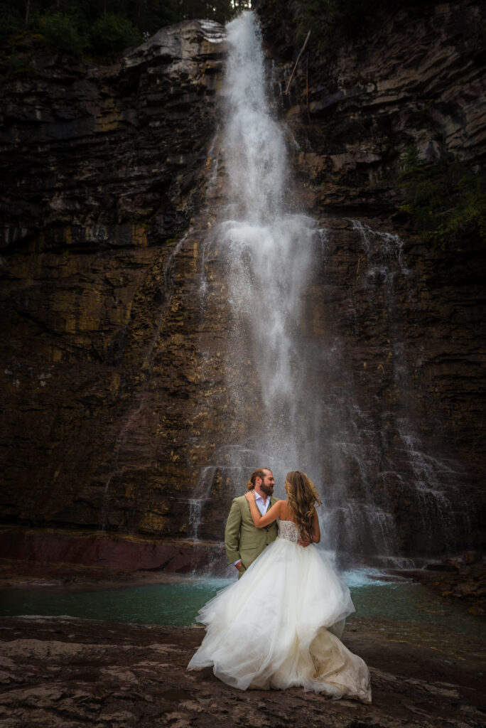 Wedding and elopement in Glacier National Park waterfall